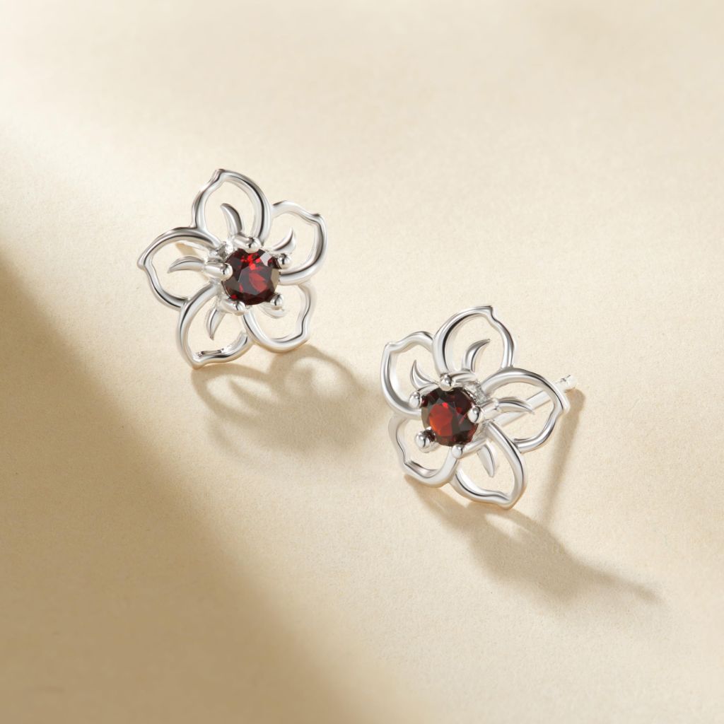Amazon Essentials Sterling Silver Garnet Flower Stud Earrings