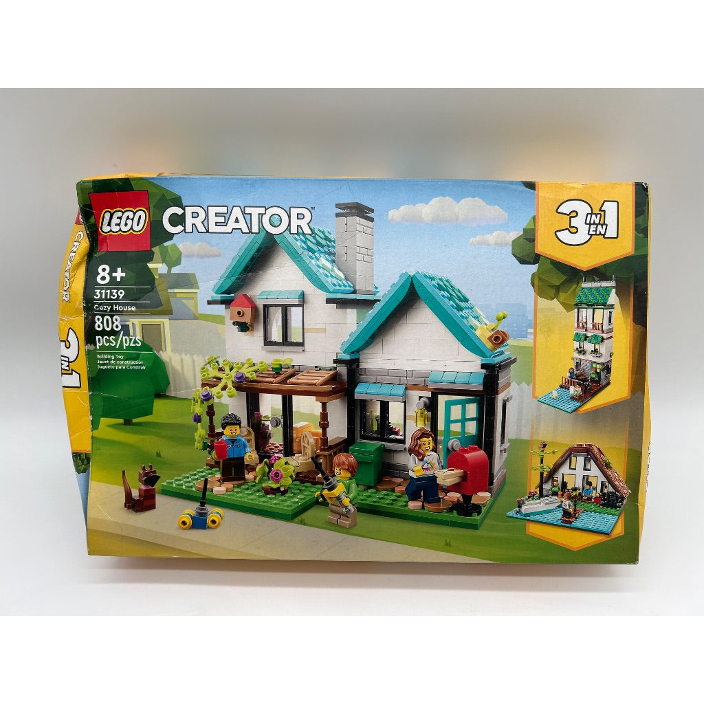 LEGO Creator 3 in 1 Cozy House Building Kit  Rebuild Into 3 Different Houses  Includes Family Minifigures and Accessories  DIY Building Toy Ideas for