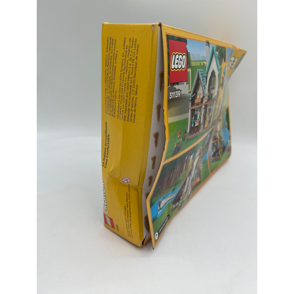 LEGO Creator 3 in 1 Cozy House Building Kit  Rebuild Into 3 Different Houses  Includes Family Minifigures and Accessories  DIY Building Toy Ideas for