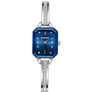 Ellen Tracy Women's Silver Bangle Watch – Blue Sunray Octagon Dial with Faceted Crystal Accents, 20mm Petite Case