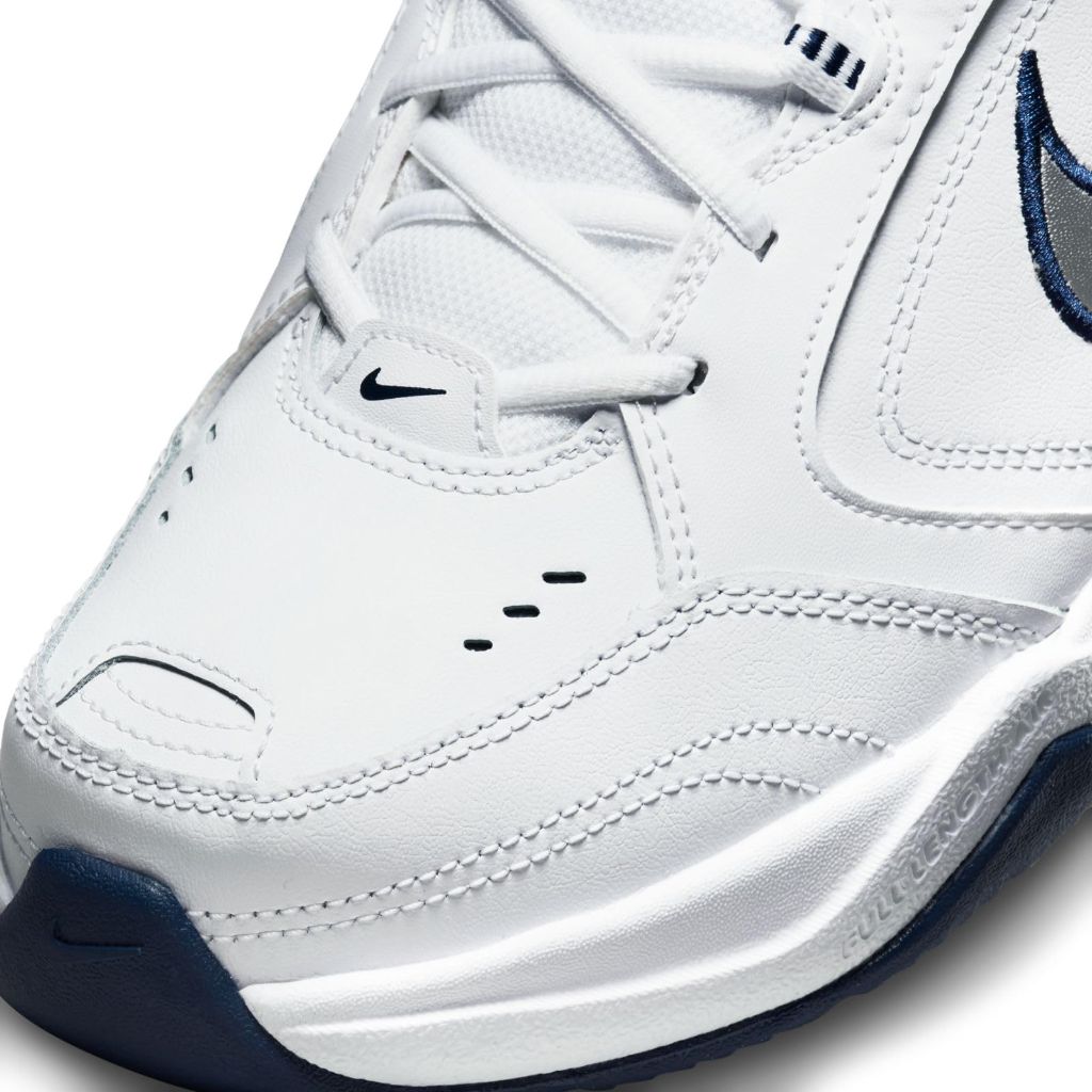 SZ 9 WD, Nike Men's Air Monarch Iv Sneaker, White Metallic Silver 102