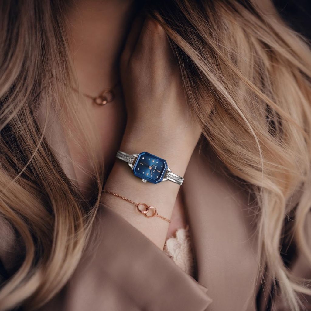 Ellen Tracy Women's Silver Bangle Watch – Blue Sunray Octagon Dial with Faceted Crystal Accents, 20mm Petite Case